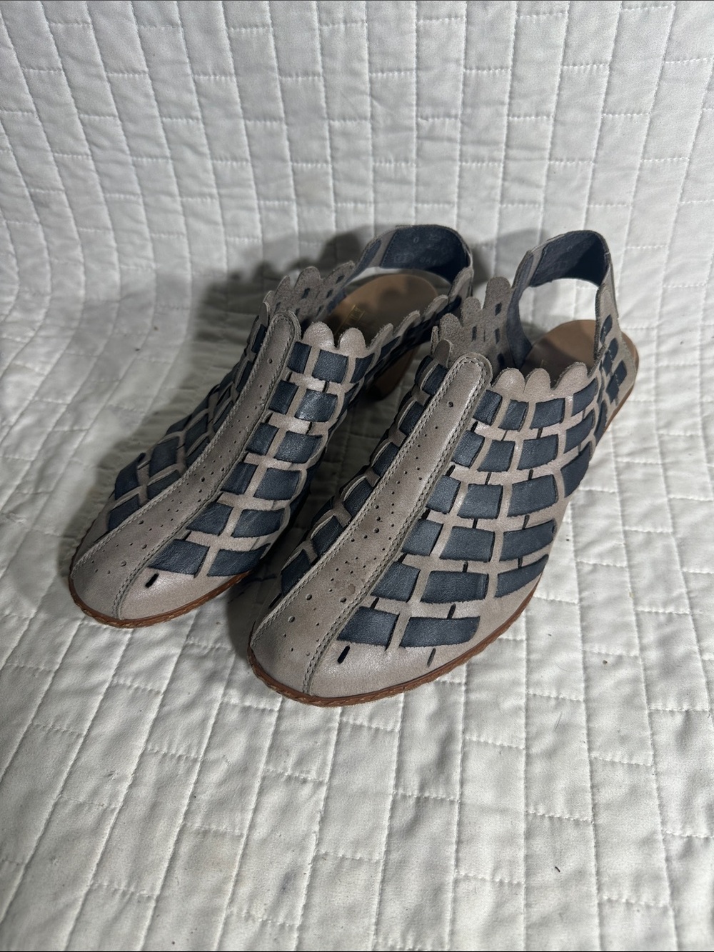 Rieker Sina heeled shoes featuring a distinct woven leather upper